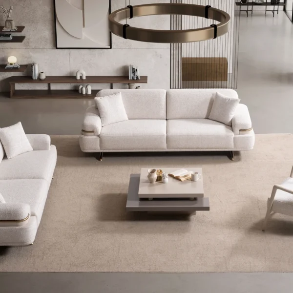 Cora Sofa Set featuring two sofas and an armchair arranged around a coffee table in a modern living room setting.