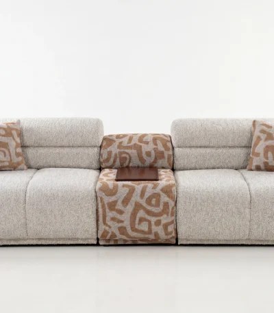 A meeting point of natural tones and unparalleled comfort. Bring a bohemian touch to your living space with the Aloha Sofa.