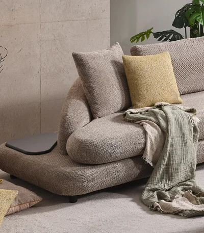 Experience ultimate comfort with the Cloud Sofa. Its modular design and trendy texture add a soft, organic touch to any modern European living space.