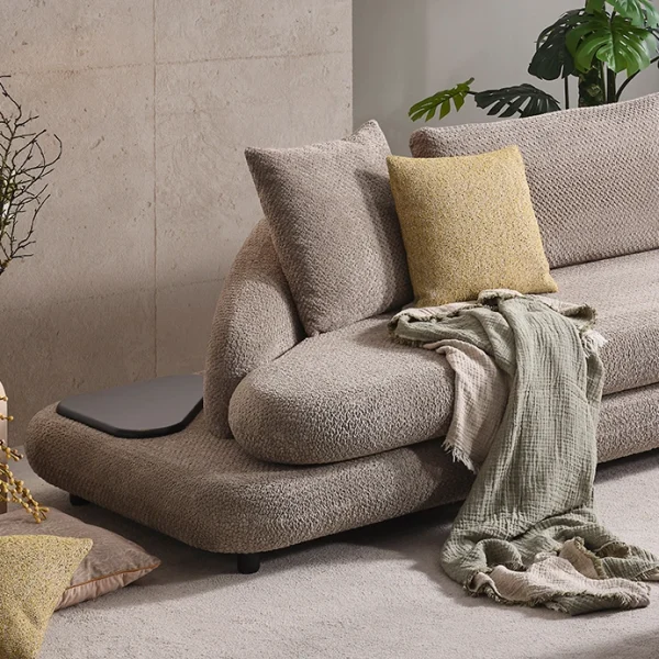 Experience ultimate comfort with the Cloud Sofa. Its modular design and trendy texture add a soft, organic touch to any modern European living space.