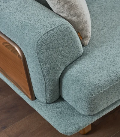 The Echo Sofa combines architecture with the soothing touch of fabric. A timeless piece designed for superior comfort and minimalist elegance in your living room.