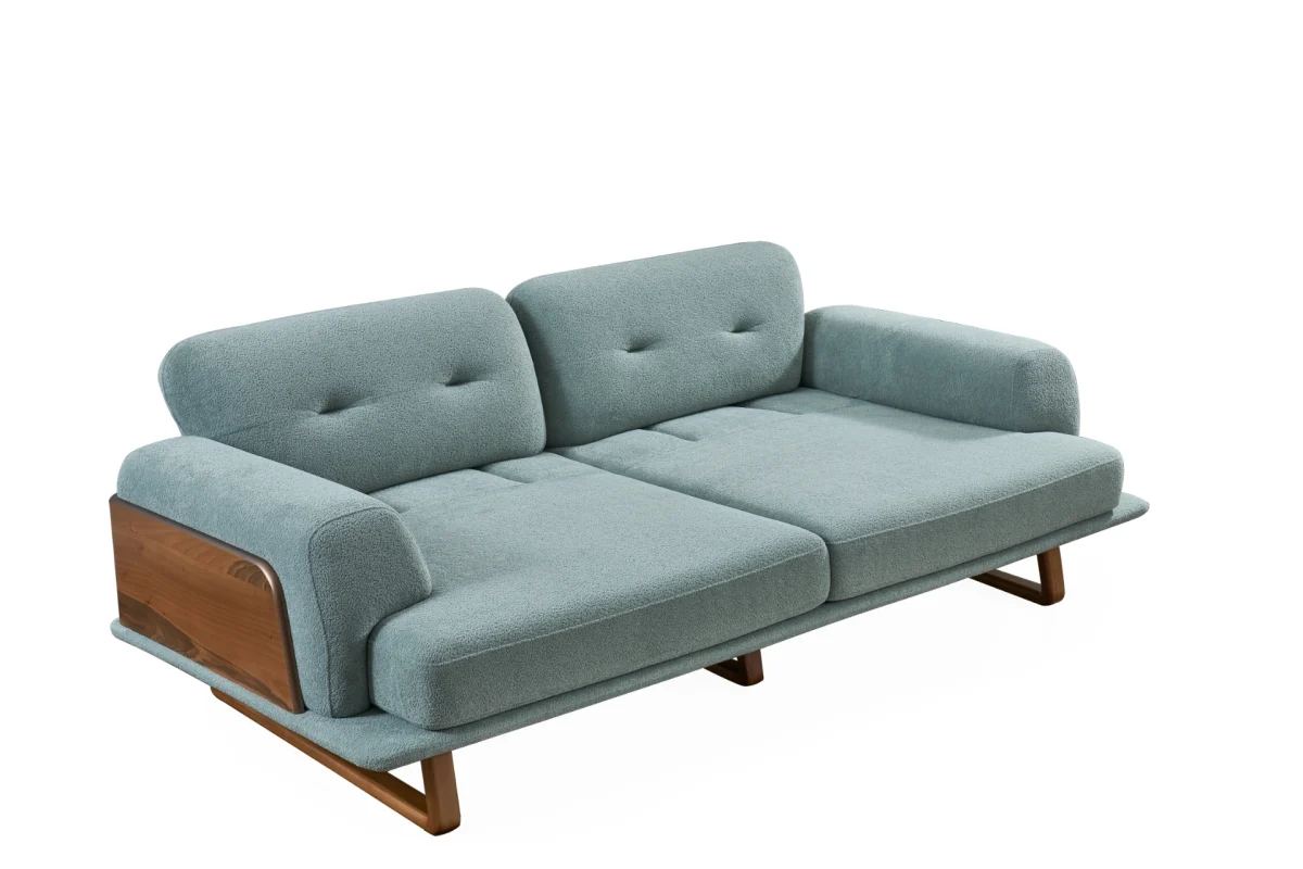 The Echo Sofa combines architecture with the soothing touch of fabric. A timeless piece designed for superior comfort and minimalist elegance in your living room.