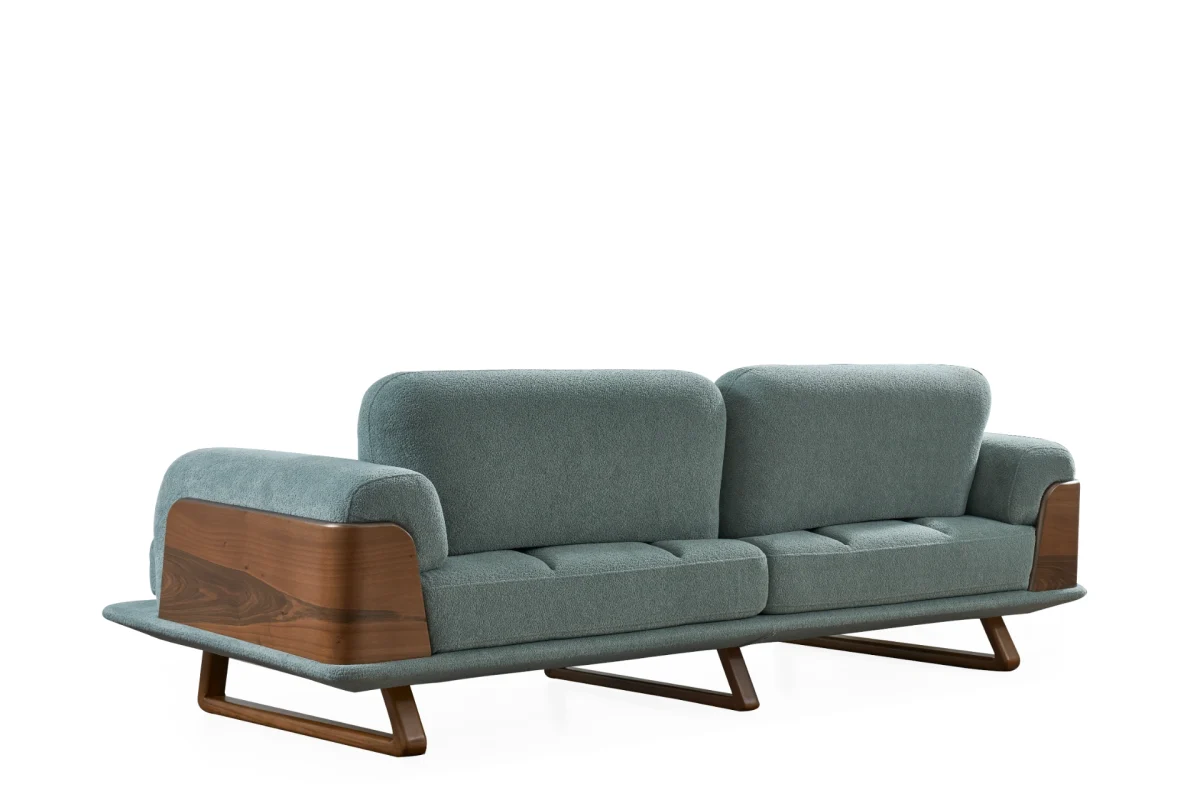 The Echo Sofa combines architecture with the soothing touch of fabric. A timeless piece designed for superior comfort and minimalist elegance in your living room.