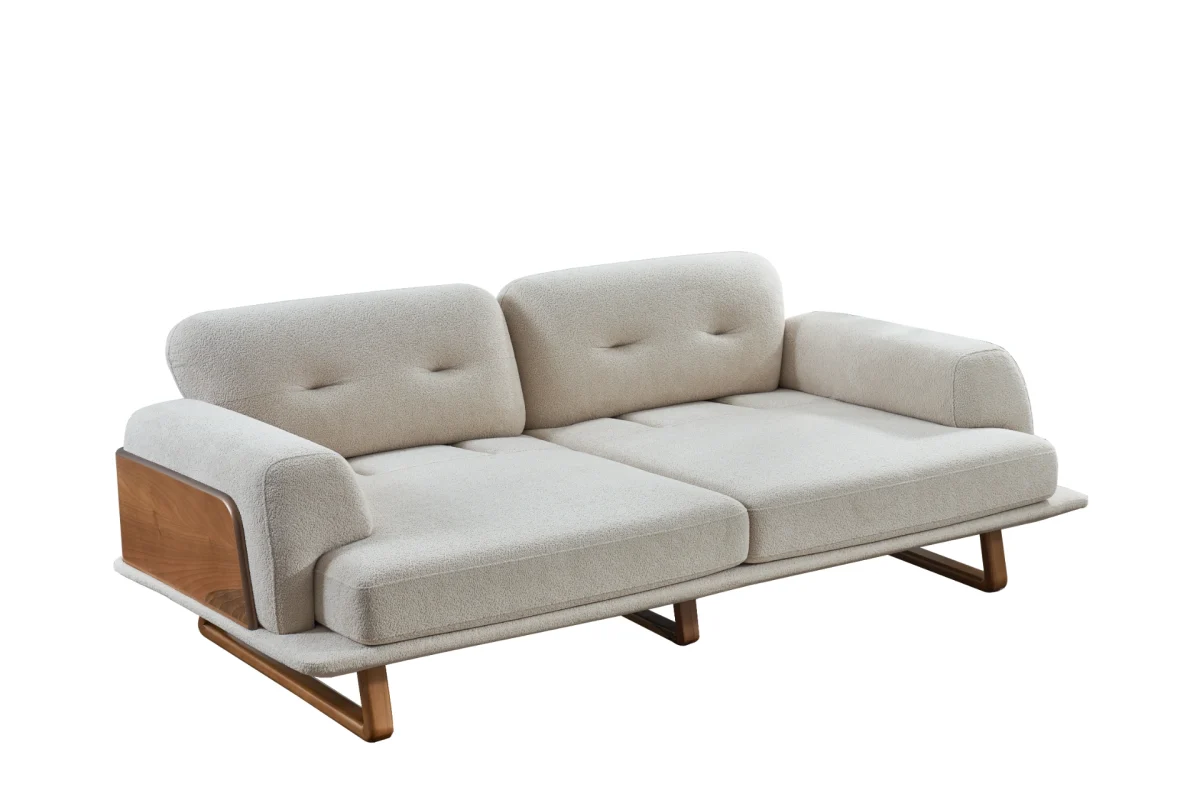 The Echo Sofa combines architecture with the soothing touch of fabric. A timeless piece designed for superior comfort and minimalist elegance in your living room.