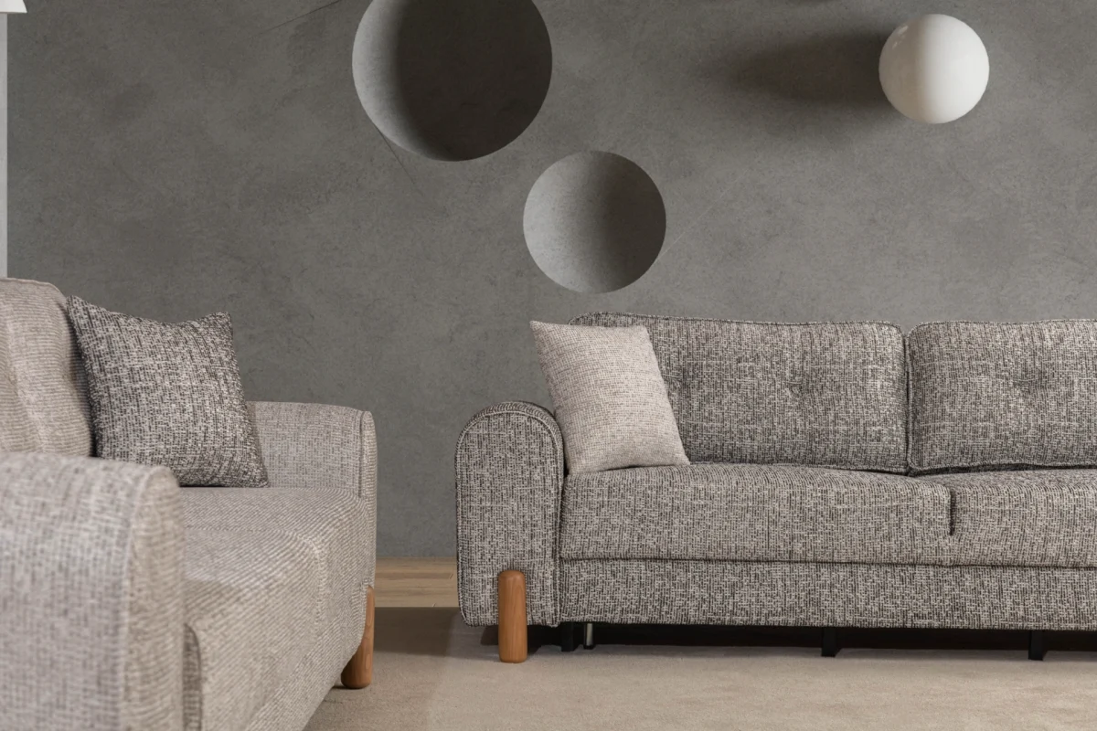 The Elina Sofa Set redefines contemporary lifestyle with its unique textured upholstery and minimalist silhouette. It's designed for those who value both aesthetic elegance and everyday durability.