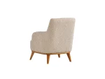 The Elysian Armchair combines organic curves with a comfortable texture. Designed for ultimate relaxation, this armchair brings a touch of modern Turkish craftsmanship to any European home.