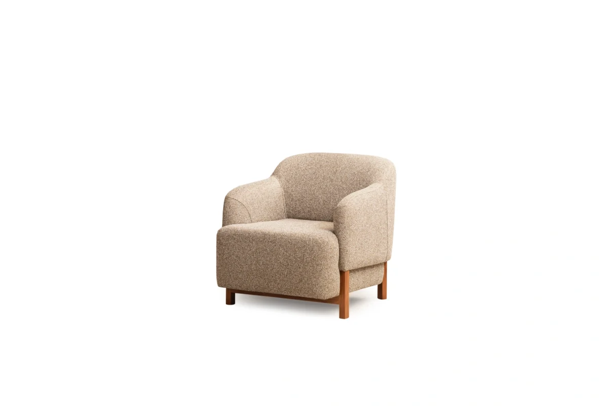The Estelle Armchair is a masterpiece of texture and form. With its soothing fabric and elegant legs, it is the perfect complement to any modern European home.