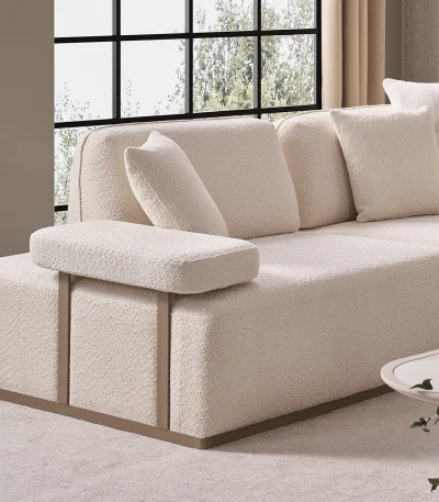 The Inara Corner Sofa adds a sophisticated touch to your living space with its timeless fabric and minimalist design. Its modular structure allows it to perfectly fit into any room.