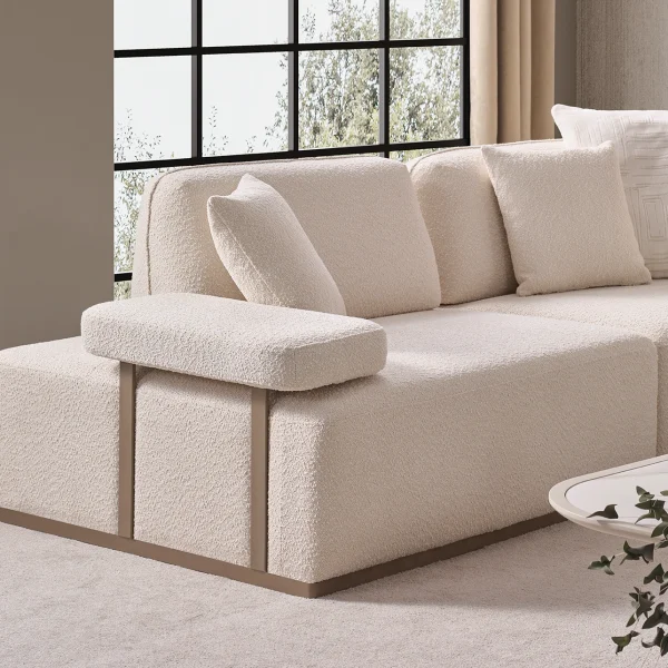 The Inara Corner Sofa adds a sophisticated touch to your living space with its timeless fabric and minimalist design. Its modular structure allows it to perfectly fit into any room.