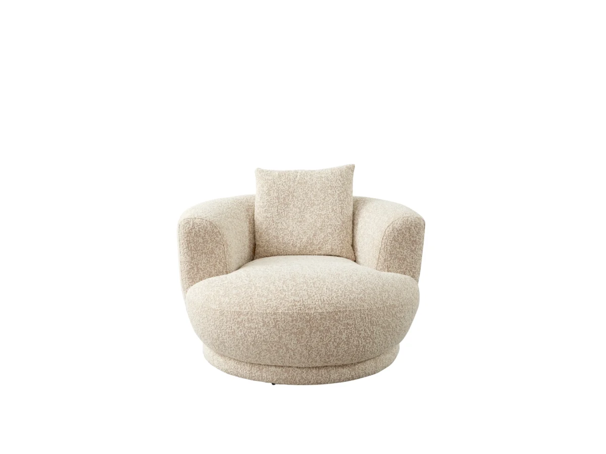The Loris Armchair is a masterpiece of organic design. With its signature texture, it offers unparalleled comfort and style for any modern home.
