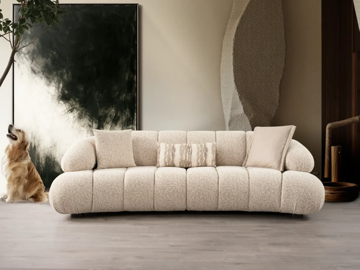 The Loris Sofa brings sculptural elegance to your home. With its signature texture and soft fabric, it offers a sophisticated relaxation experience for contemporary living.