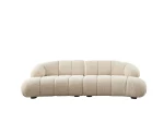 The Loris Sofa brings sculptural elegance to your home. With its signature texture and soft fabric, it offers a sophisticated relaxation experience for contemporary living.