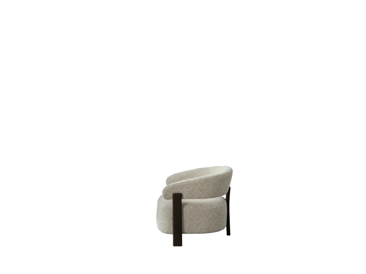The Maya armchair adds elegance to your home with its organic curves and touch-sensitive fabric. It's designed for cozy corners or as a superior addition to your living room set.