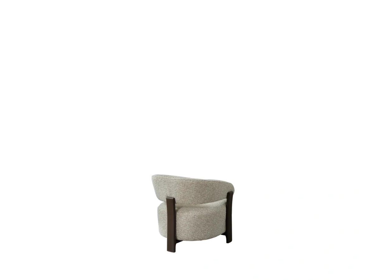 The Maya armchair adds elegance to your home with its organic curves and touch-sensitive fabric. It's designed for cozy corners or as a superior addition to your living room set.