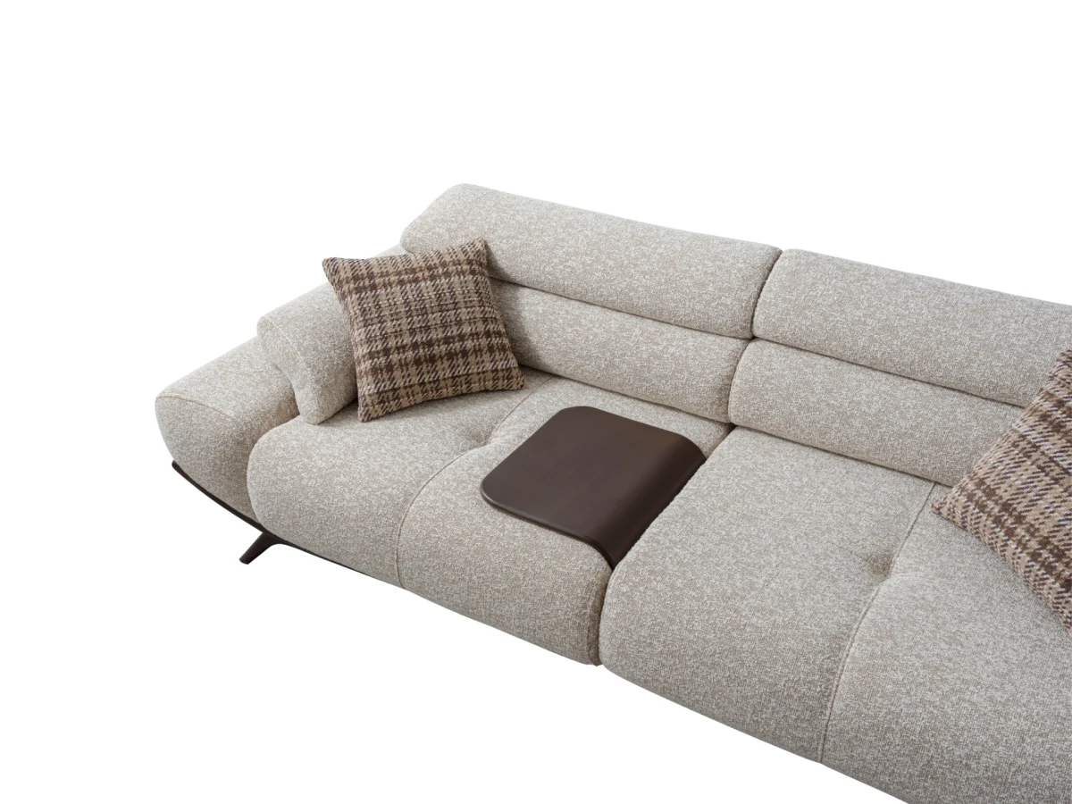 The Maya Sofa combines organic curves with functional luxury. With its fashionable texture and integrated side trays, it's the ultimate statement piece for modern European homes.