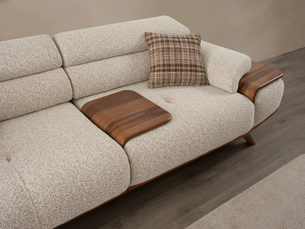 The Maya Sofa combines organic curves with functional luxury. With its fashionable texture and integrated side trays, it's the ultimate statement piece for modern European homes.