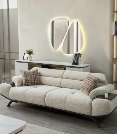 The Maya Sofa combines organic curves with functional luxury. With its fashionable texture and integrated side trays, it's the ultimate statement piece for modern European homes.