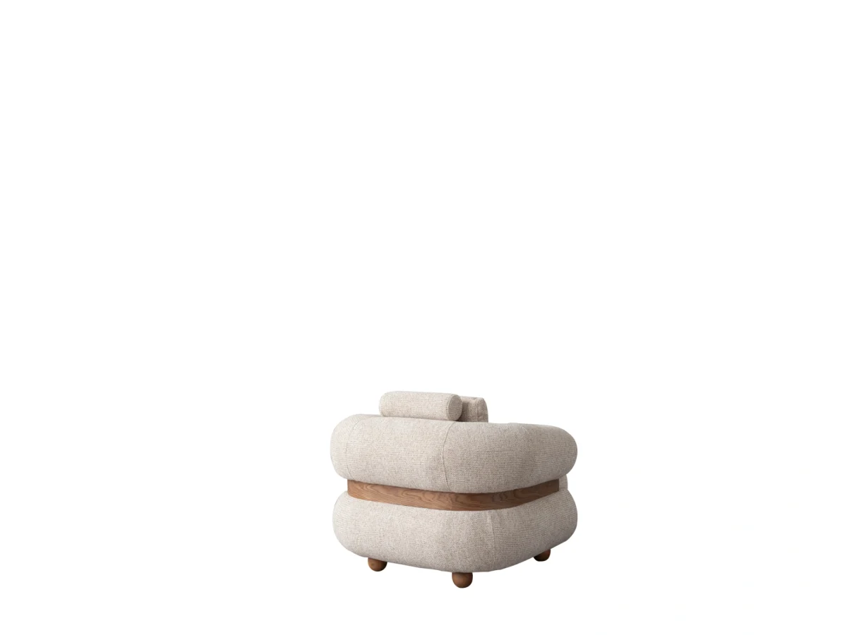 The Milan Armchair is a masterpiece of organic design with its soft upholstery and unique details. It offers a perfect blend of modern sculpture and comfort for any room.