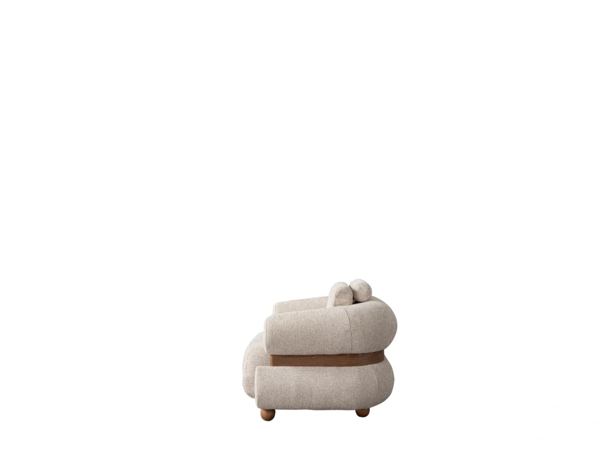 The Milan Armchair is a masterpiece of organic design with its soft upholstery and unique details. It offers a perfect blend of modern sculpture and comfort for any room.