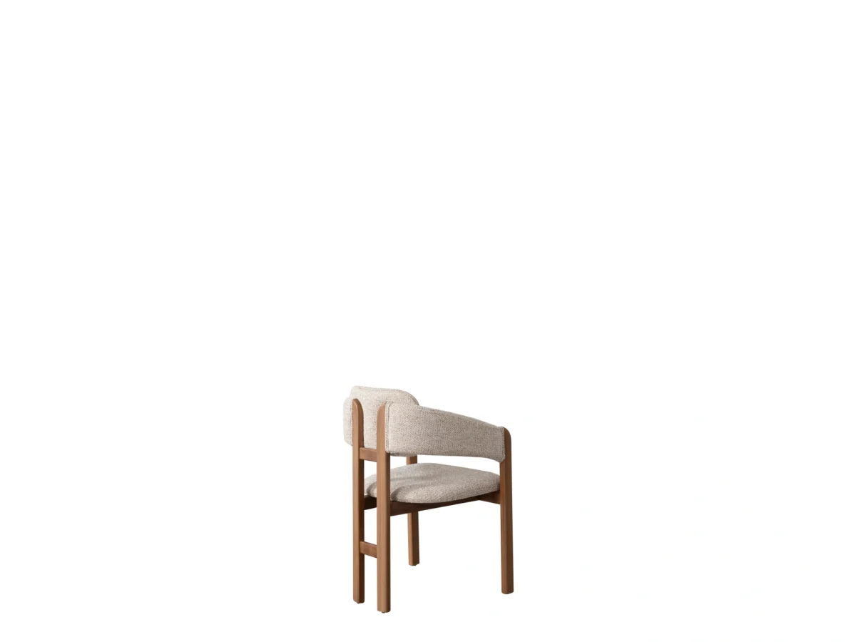 The Milan Dining Chair is a masterpiece of modern seating design, crafted to add an "Organic Modern" elegance to your dining room. Its distinctive curved backrest is meticulously designed to provide ergonomic support while maintaining a sleek and minimalist silhouette. Upholstered in our signature premium fabric, this chair offers both a comfortable and sophisticated tactile experience.