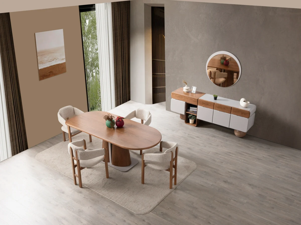 The Milan Dining Table Set is a masterpiece of contemporary craftsmanship. Designed to be the heart of your home, this set includes a stunning dining table with a bold, sculptural pedestal. Its rounded edges create an atmosphere perfect for long meals and meaningful conversations.