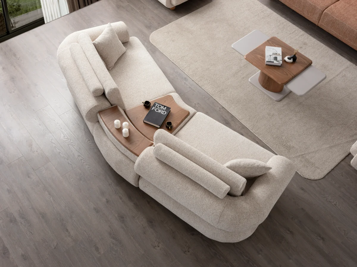 The Milan Sofa is an expression of modern elegance and organic design. This unique sofa is meticulously crafted for contemporary European homes. The rich, tactile fabric adds warmth and a high-end feel to any living space.