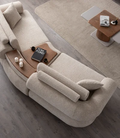 The Milan Sofa is an expression of modern elegance and organic design. This unique sofa is meticulously crafted for contemporary European homes. The rich, tactile fabric adds warmth and a high-end feel to any living space.