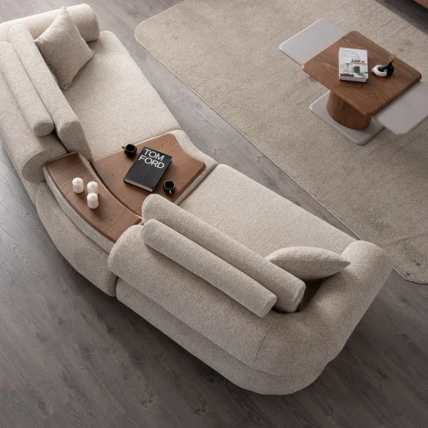 The Milan Sofa is an expression of modern elegance and organic design. This unique sofa is meticulously crafted for contemporary European homes. The rich, tactile fabric adds warmth and a high-end feel to any living space.