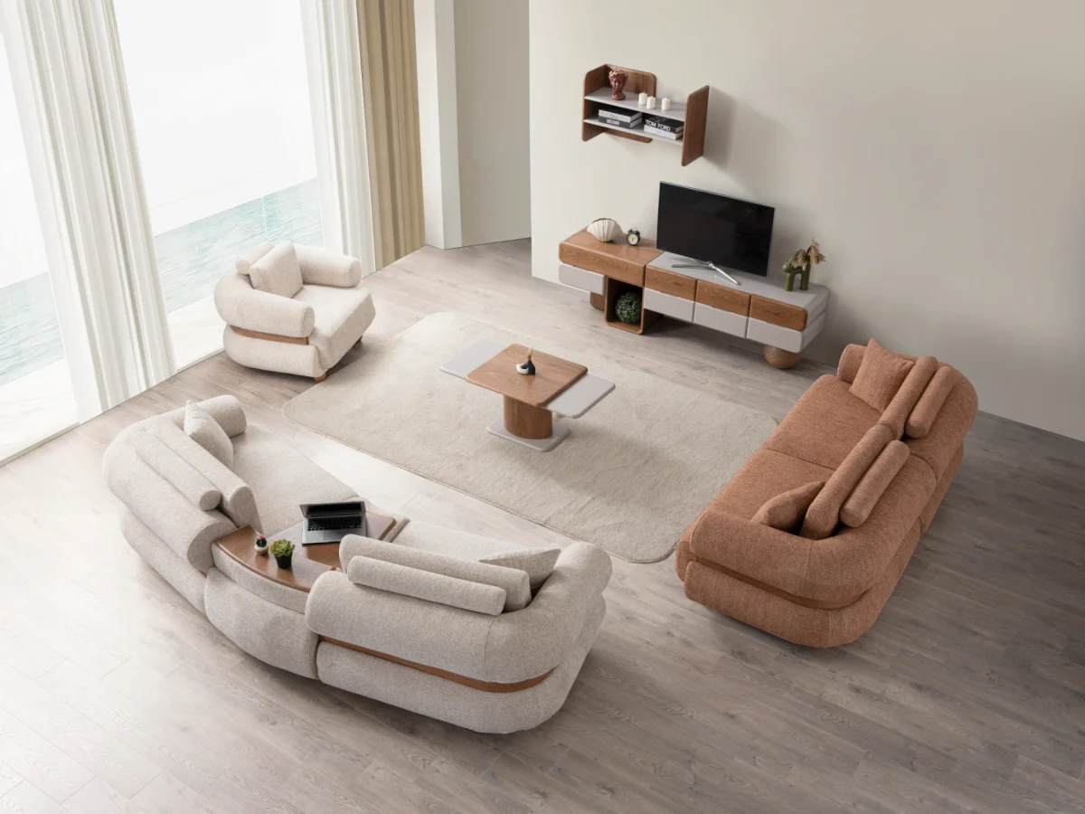 The Milan Sofa Set combines organic curves with elegant fabric textures. This modular masterpiece offers flexible seating arrangements.