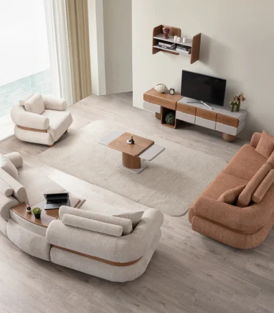 The Milan Sofa Set combines organic curves with elegant fabric textures. This modular masterpiece offers flexible seating arrangements.