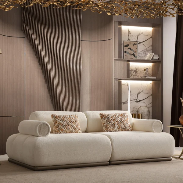 The Rumi Sofa in a sophisticated, contemporary interior with dark paneled walls and warm lighting, creating an atmosphere of deep harmony and artistic tranquility.