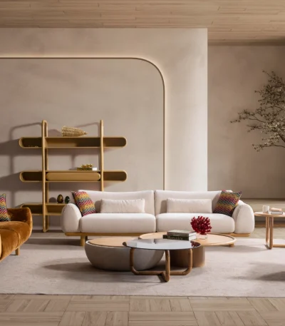 The Thalia Sofa Set redefines modern elegance with its fluid, organic silhouette and tactile fabric. A masterpiece of comfort designed for sophisticated homes.