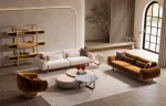 The Thalia Sofa Set redefines modern elegance with its fluid, organic silhouette and tactile fabric. A masterpiece of comfort designed for sophisticated homes.