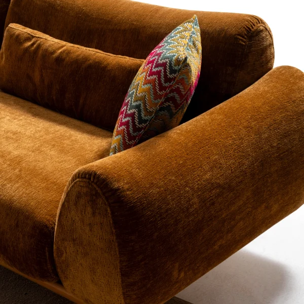 The Thalia Sofa combines organic, rounded lines with the rich texture of premium fabric. A bold piece that brings modern warmth to any living room.