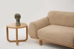 The Thalia Sofa combines organic, rounded lines with the rich texture of premium fabric. A bold piece that brings modern warmth to any living room.