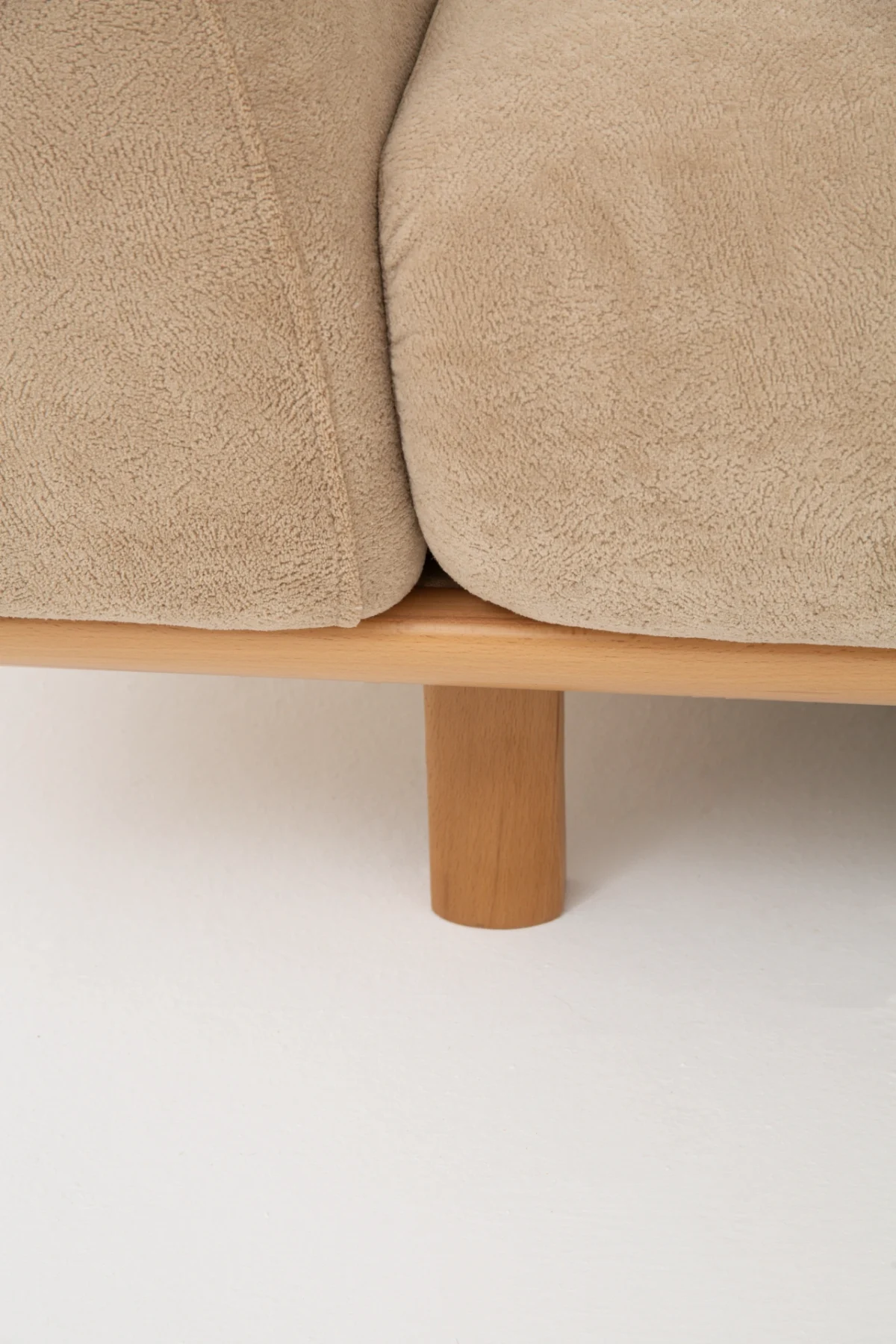 The Thalia Sofa combines organic, rounded lines with the rich texture of premium fabric. A bold piece that brings modern warmth to any living room.