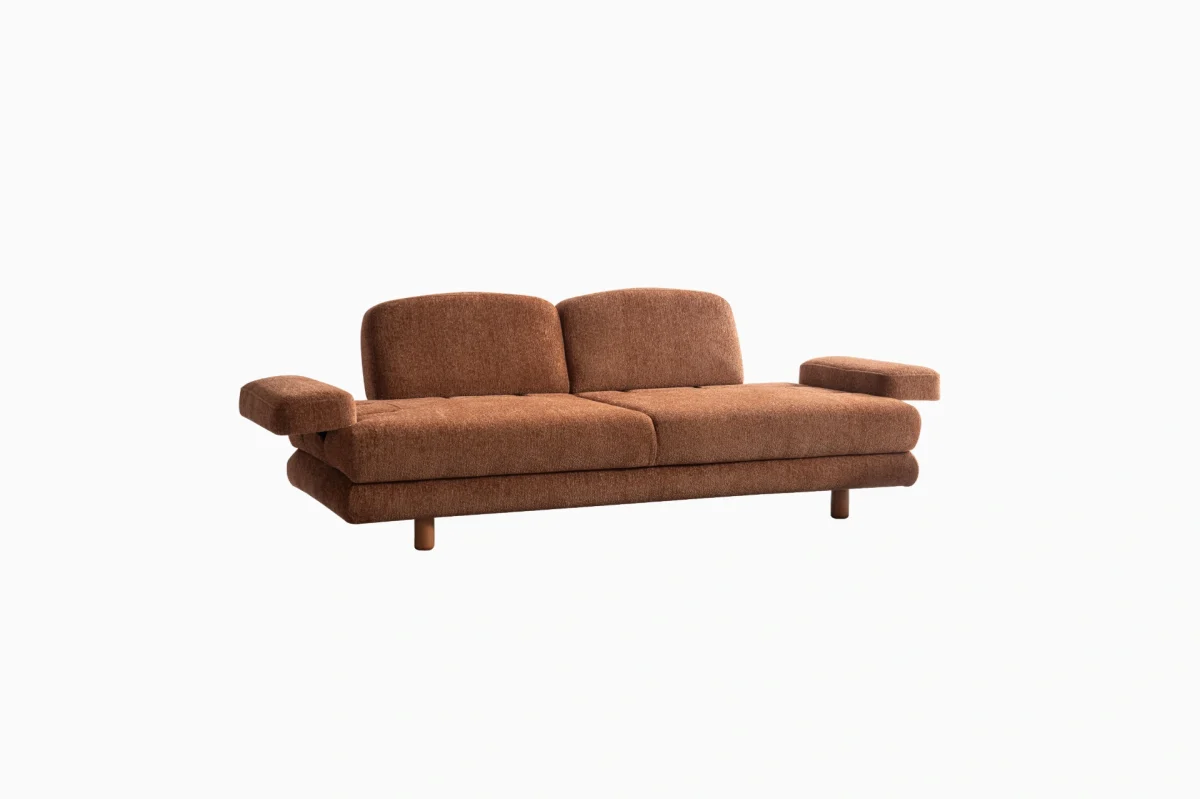 Modern living room featuring the Troyas sofa set in a warm terracotta hue, showcasing soft curves and a textured finish for a cozy, contemporary aesthetic – SofaTurkey.
