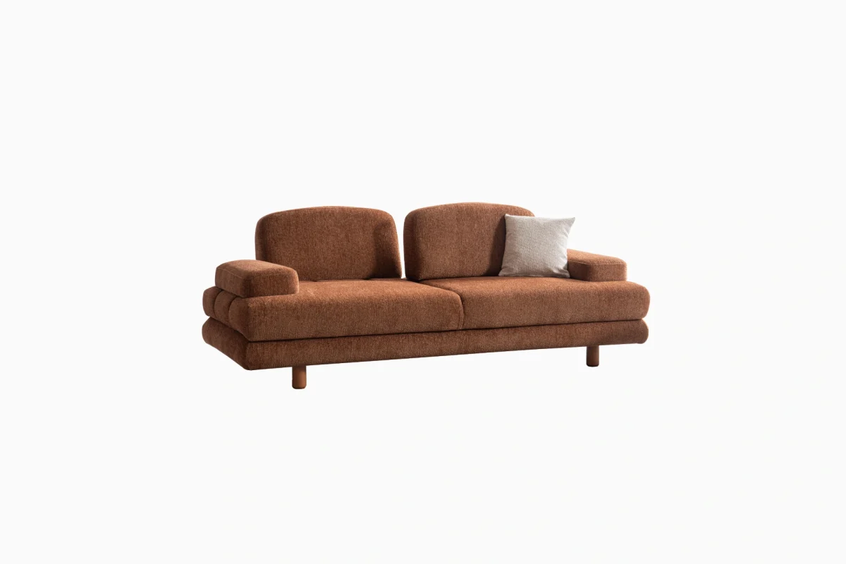 Modern living room featuring the Troyas sofa set in a warm terracotta hue, showcasing soft curves and a textured finish for a cozy, contemporary aesthetic – SofaTurkey.