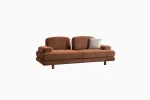 Modern living room featuring the Troyas sofa set in a warm terracotta hue, showcasing soft curves and a textured finish for a cozy, contemporary aesthetic – SofaTurkey.