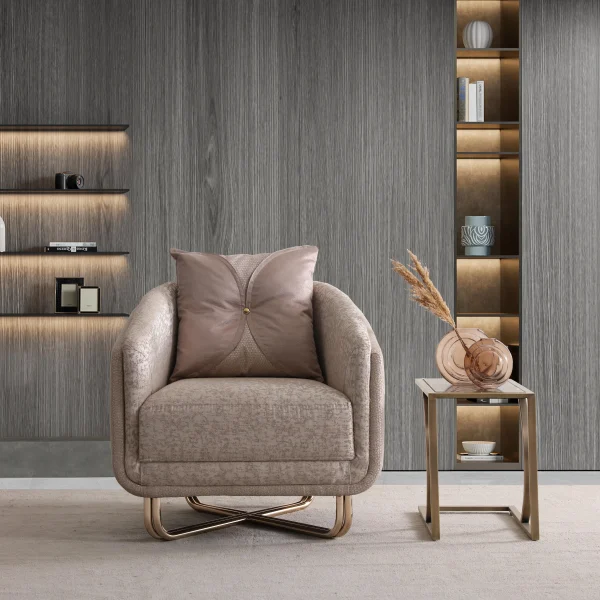 The sophisticated Aluna Armchair arranged in a bright, modern living room with marble wall accents and golden details, embodying an atmosphere of pure prestige.