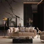 The sophisticated Aluna Sofa arranged in a bright, modern living room with marble wall accents and golden details, embodying an atmosphere of pure prestige.