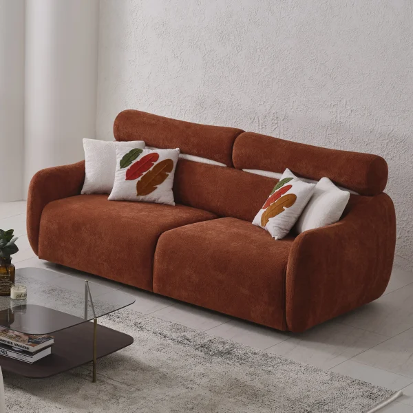 The vibrant Amora Sofa featuring textured white, orange, and grey seating in a bright, modern minimalist room, designed to create an energetic and artistic atmosphere.