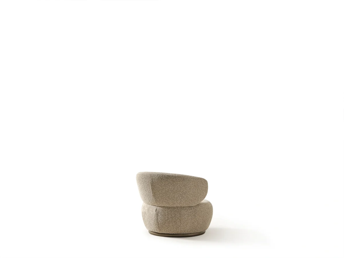 The Bolis Armchair redefines the modern living space. With its unique texture and fabric, it offers a sophisticated modular solution for contemporary European homes.