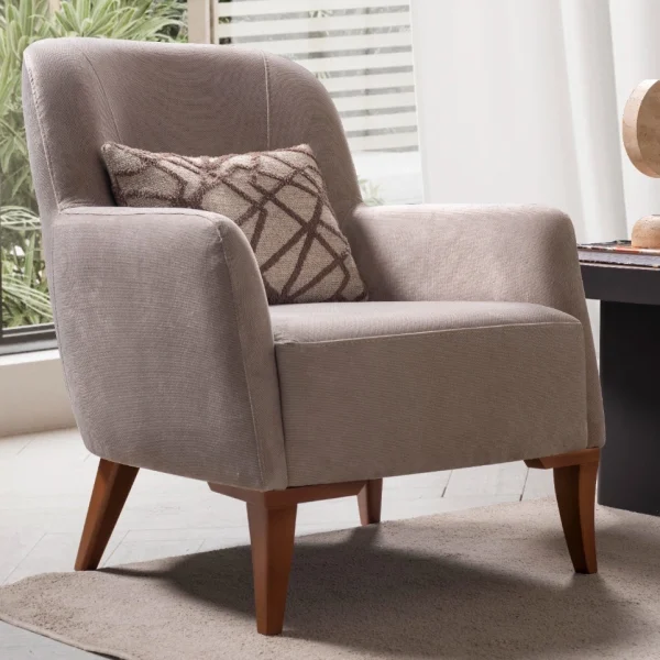 Bria Armchair featuring a high-back upholstered design, comfortable throw cushion, and tapered wooden legs.