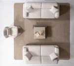 Cora Sofa Set featuring two sofas and an armchair arranged around a coffee table in a modern living room setting.