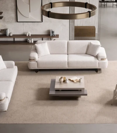 Cora Sofa Set featuring two sofas and an armchair arranged around a coffee table in a modern living room setting.