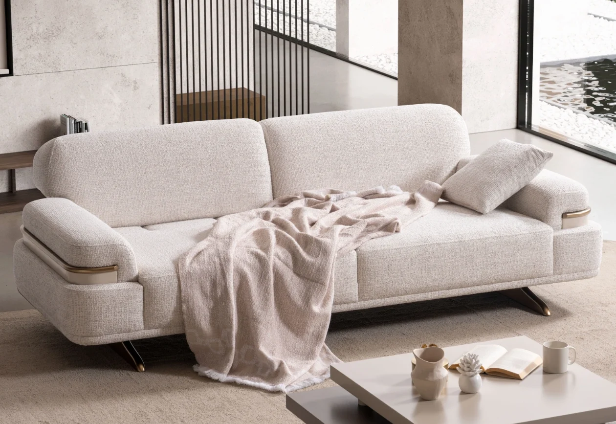 Cora sofa luxury cream functional sofa Sofaturkey living room furniture sofa 19 Cora Sofa styled in a modern interior setting with curved armrests and a wide seating surface.