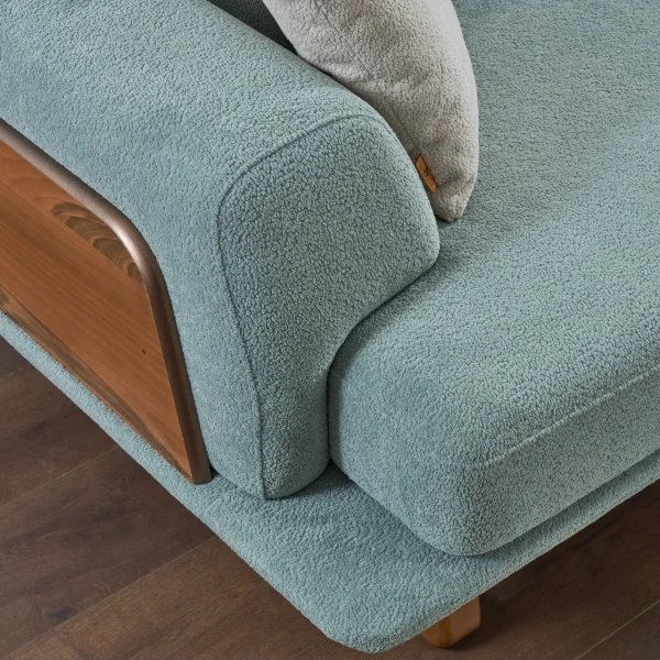 The Echo Sofa combines architecture with the soothing touch of fabric. A timeless piece designed for superior comfort and minimalist elegance in your living room.