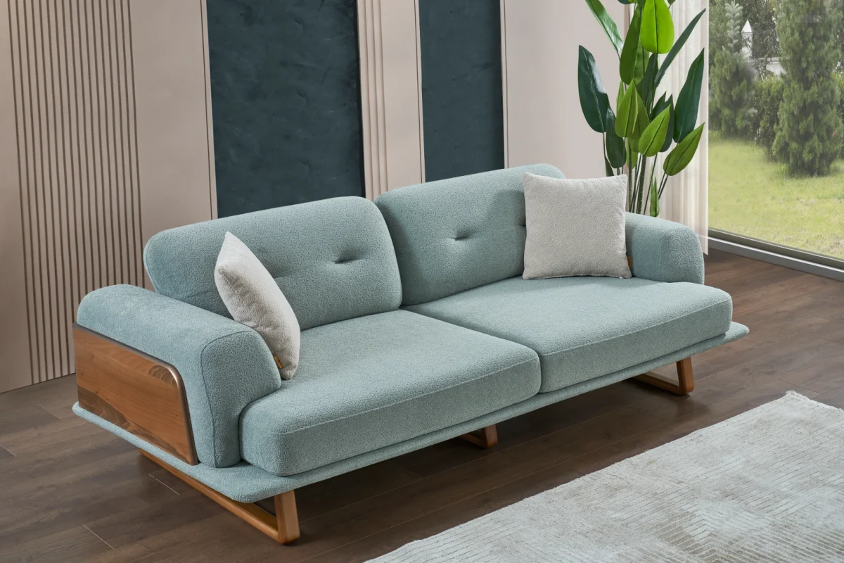 The Echo Sofa combines architecture with the soothing touch of fabric. A timeless piece designed for superior comfort and minimalist elegance in your living room.