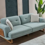 The Echo Sofa combines architecture with the soothing touch of fabric. A timeless piece designed for superior comfort and minimalist elegance in your living room.